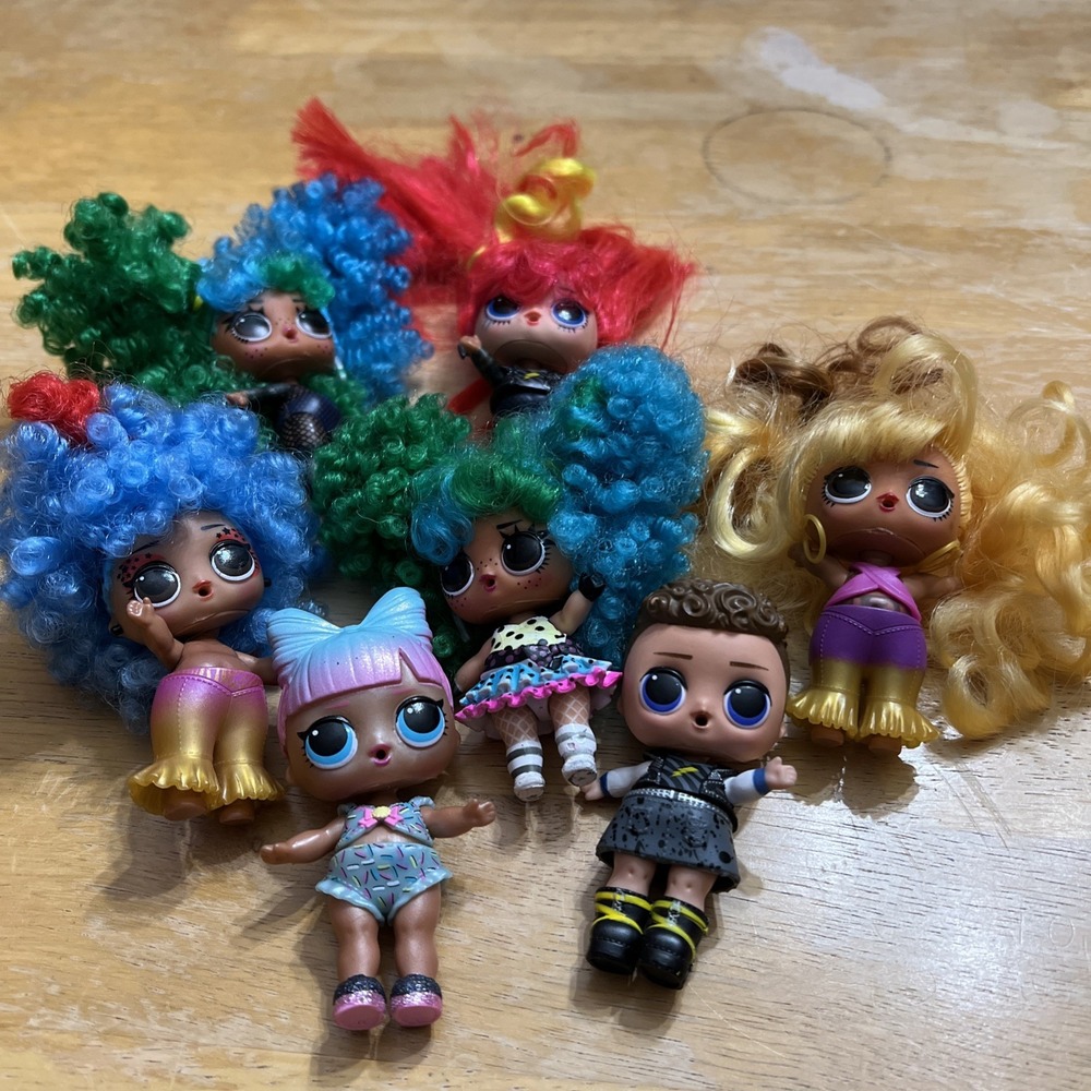 Lot Of 7 LOL OMG Surprise Dolls With Outfits
